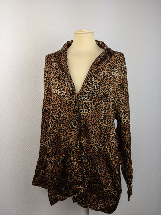 Front view of a leopard print blouse