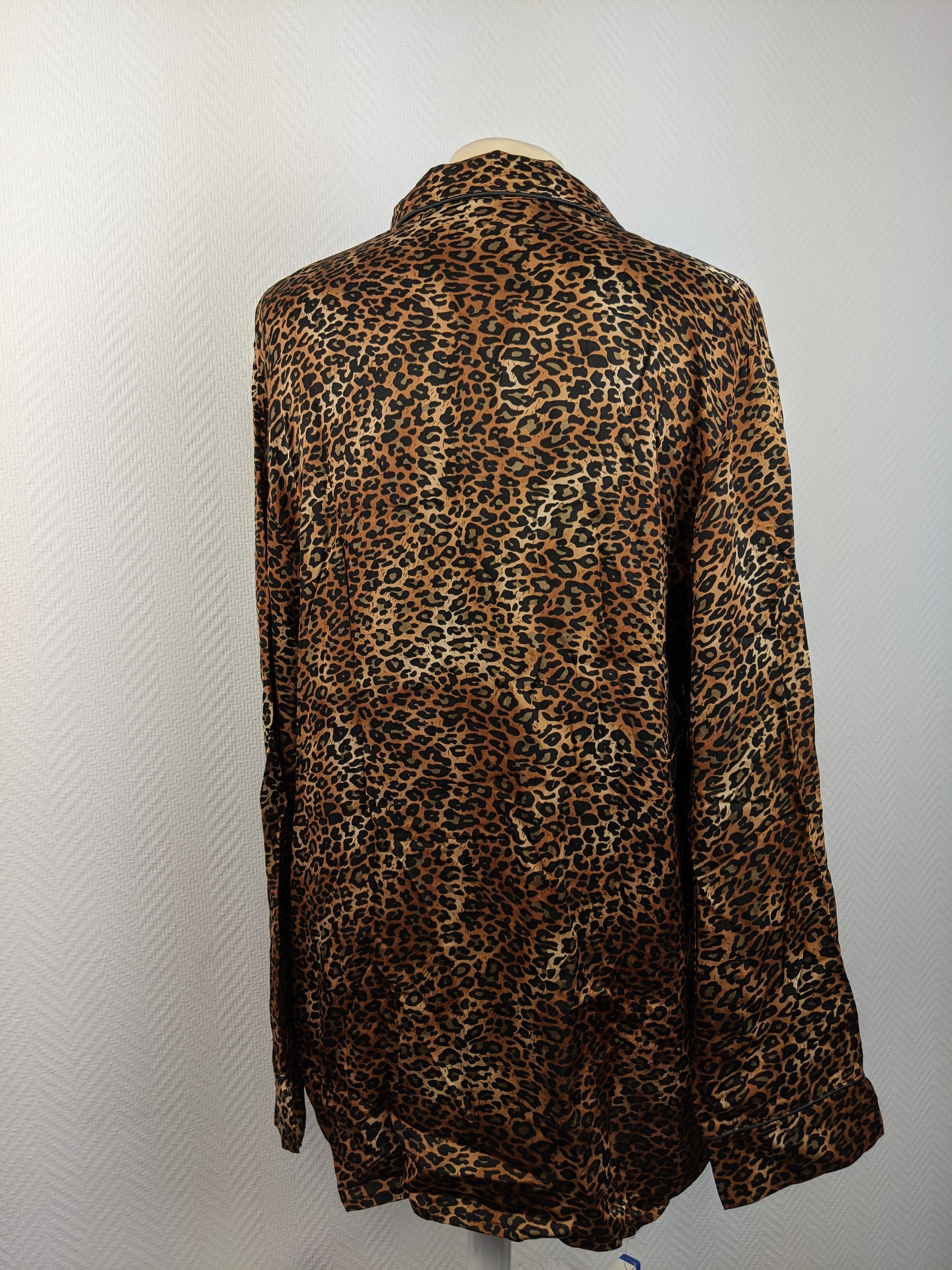 Back view of a leopard print blouse