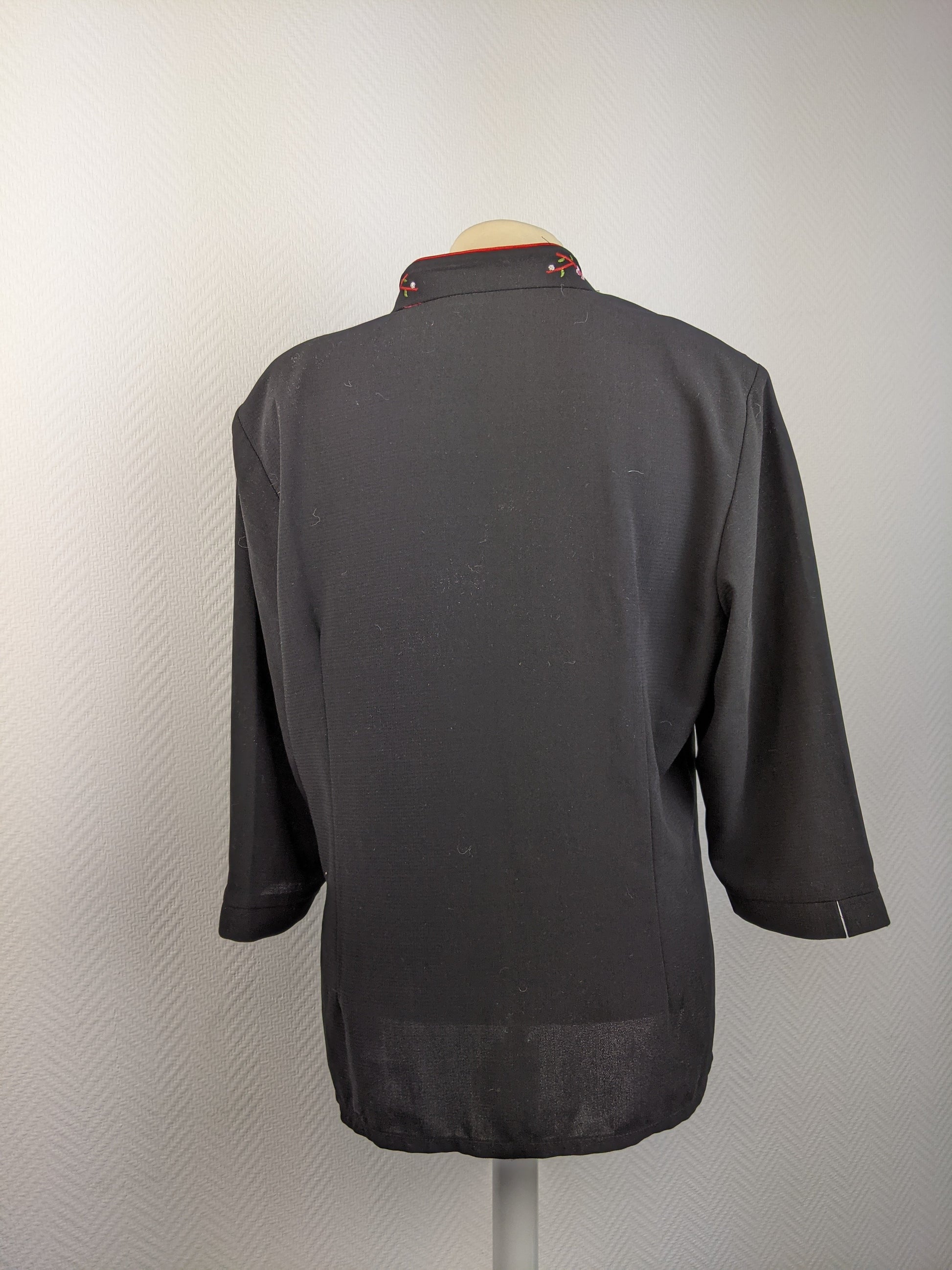 Back view of black Chinese style shirt