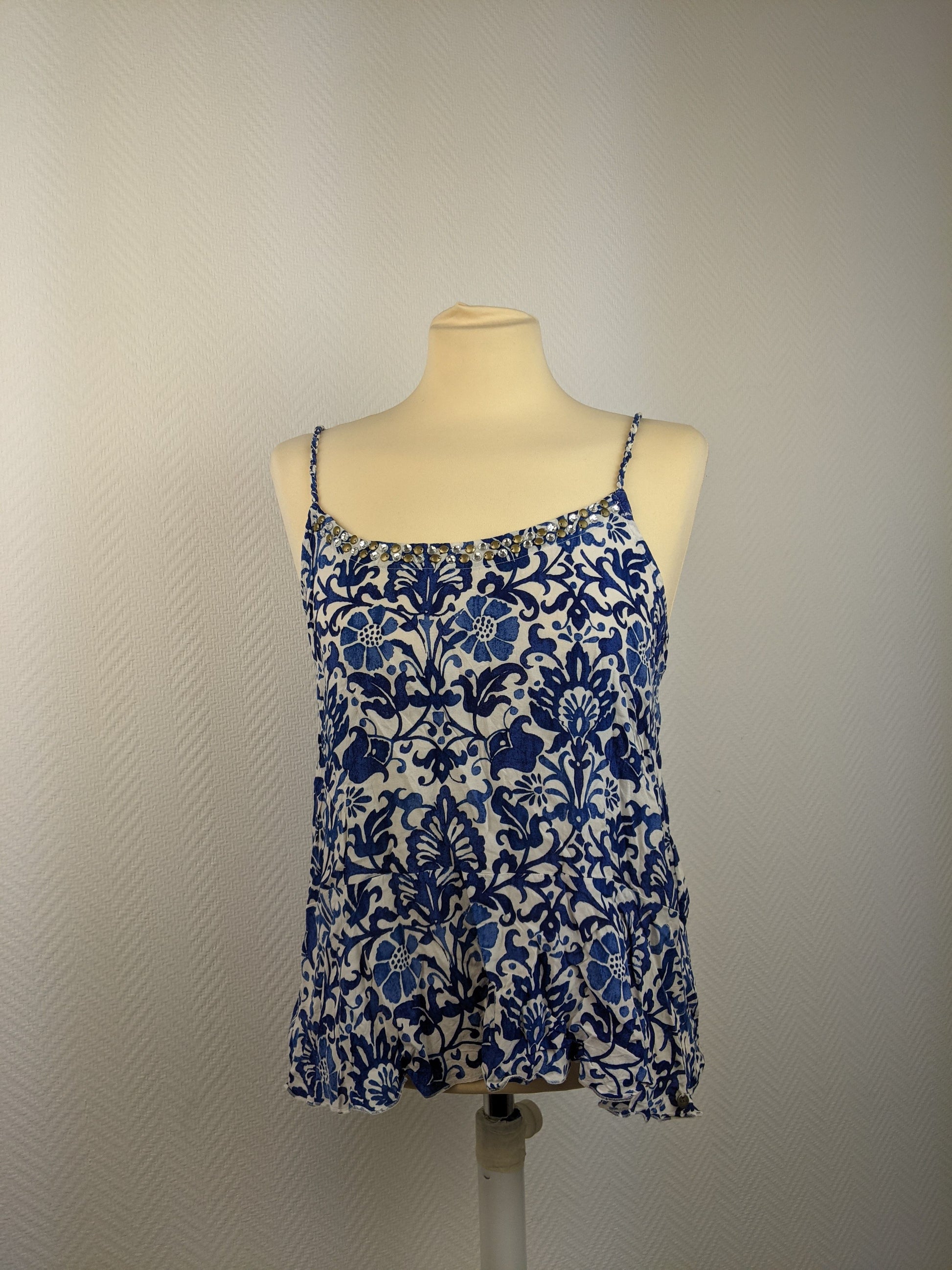 Front view of blue floral camisole