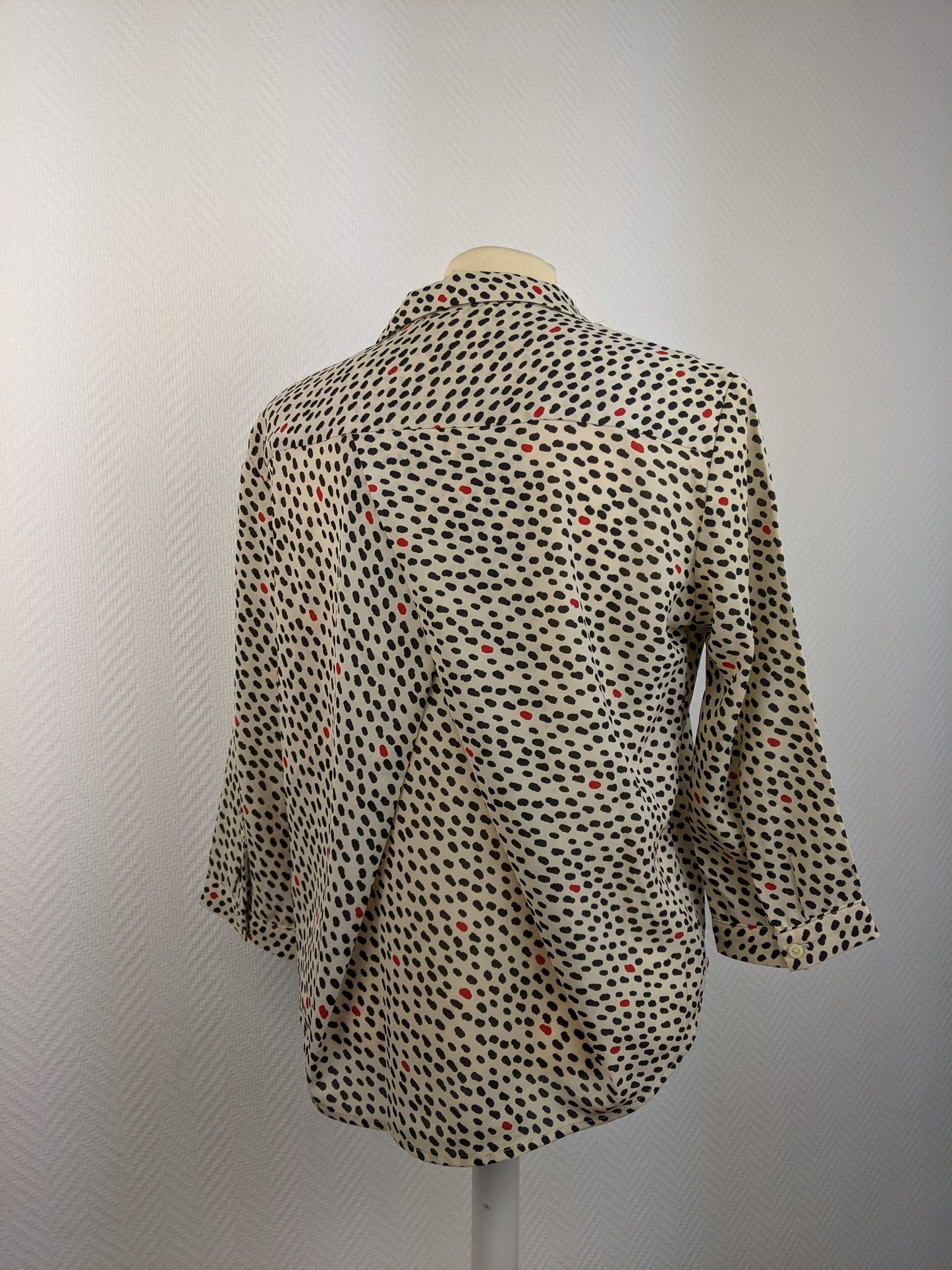 Back view of Monki polka dot button-up shirt