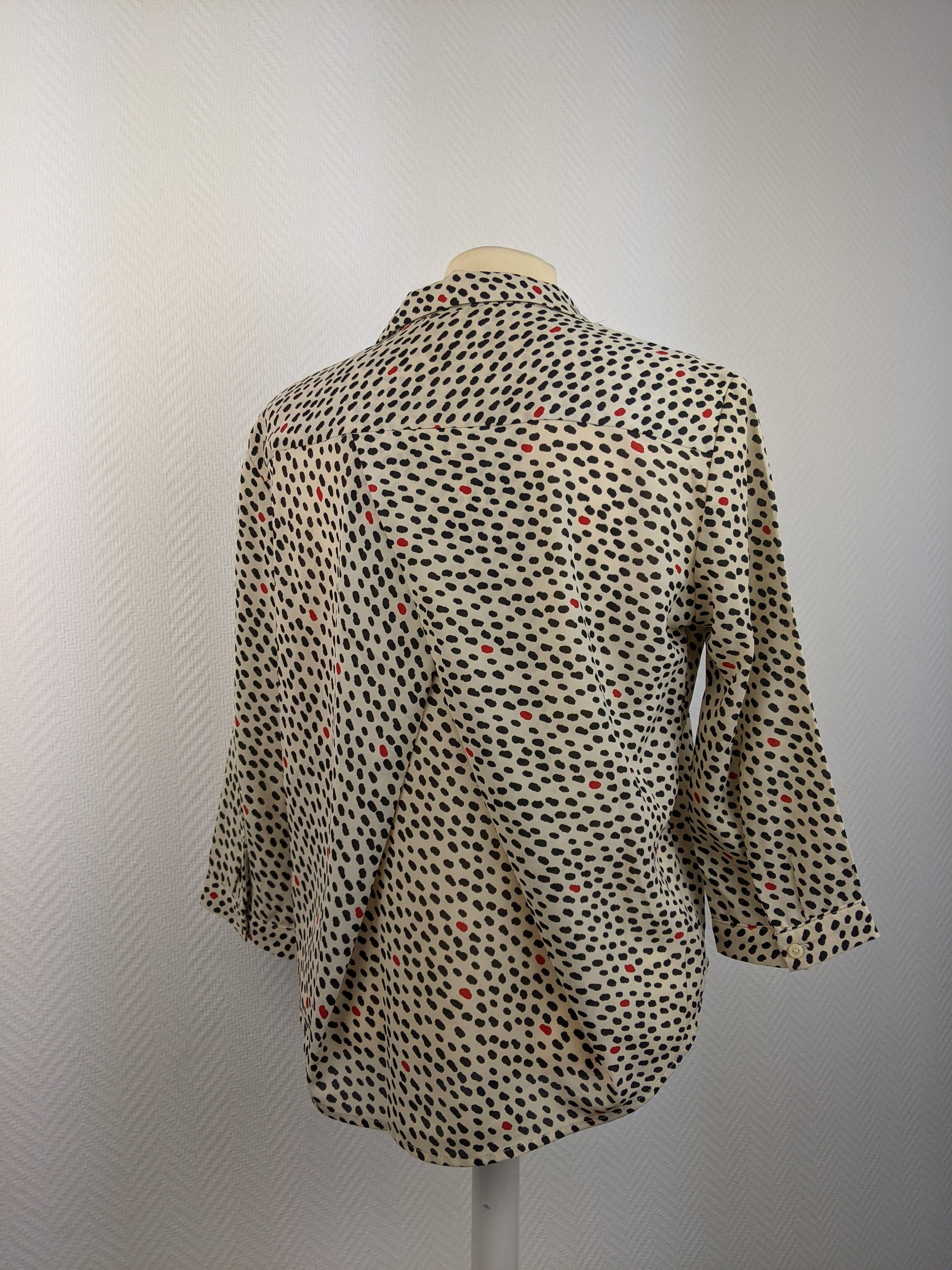 Back view of Monki polka dot button-up shirt