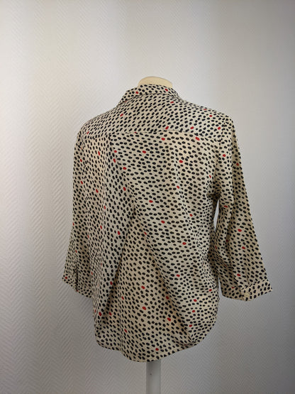 Back view of Monki polka dot button-up shirt