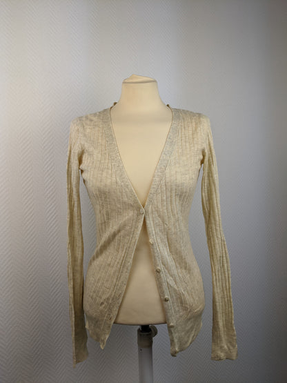 Front view of beige ribbed cardigan
