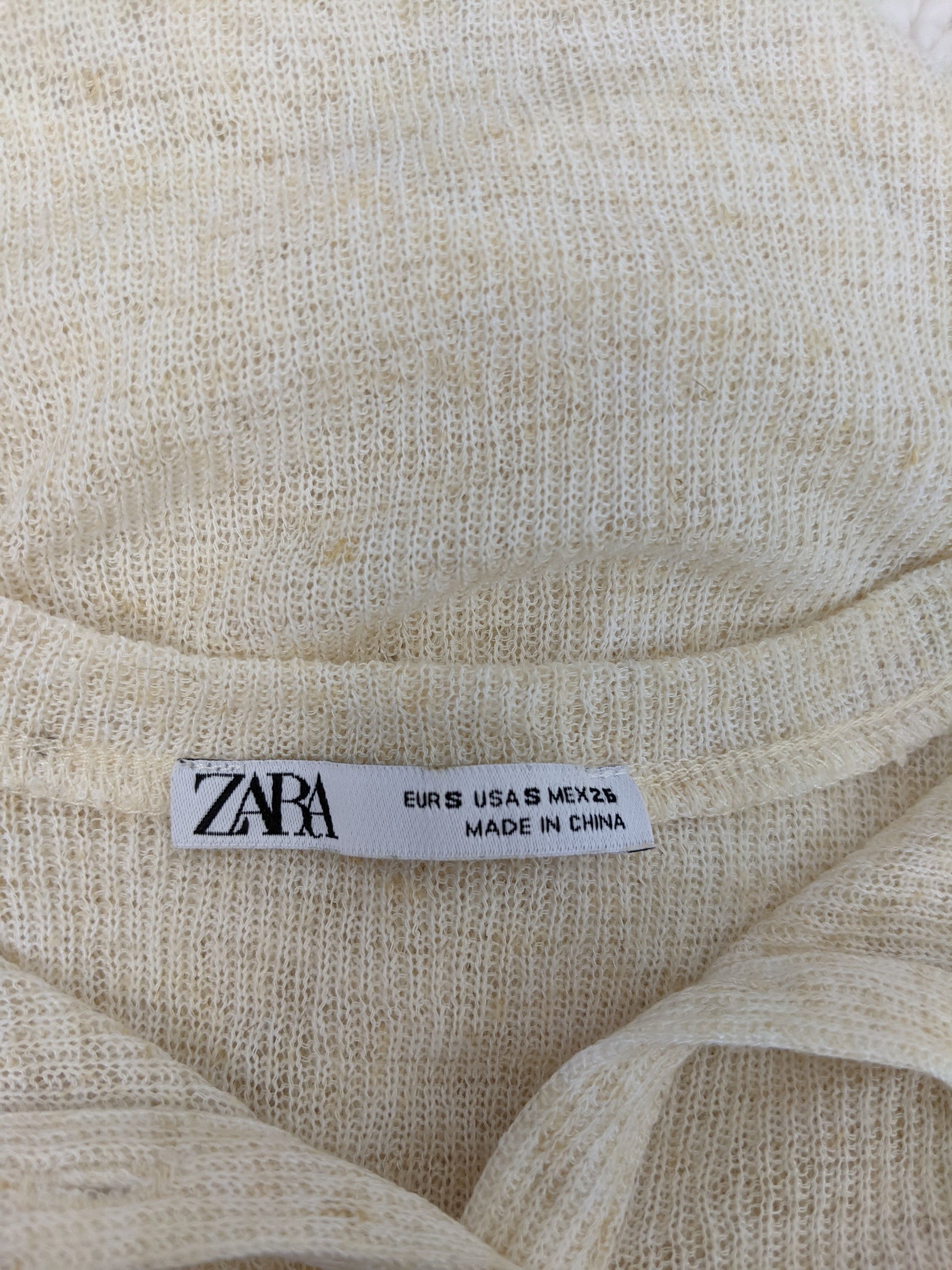 Close-up of Zara label with size information