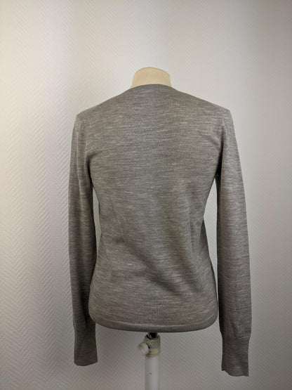 Back of grey V-neck sweater
