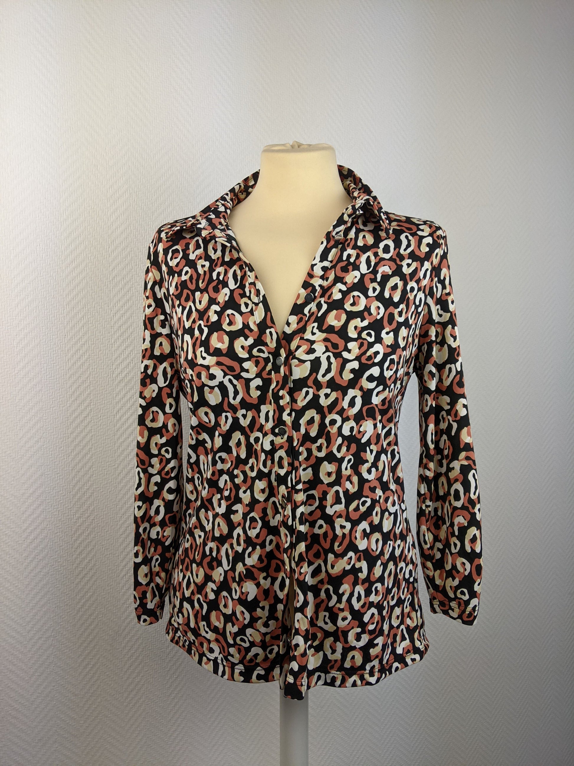 Front view of leopard print blouse