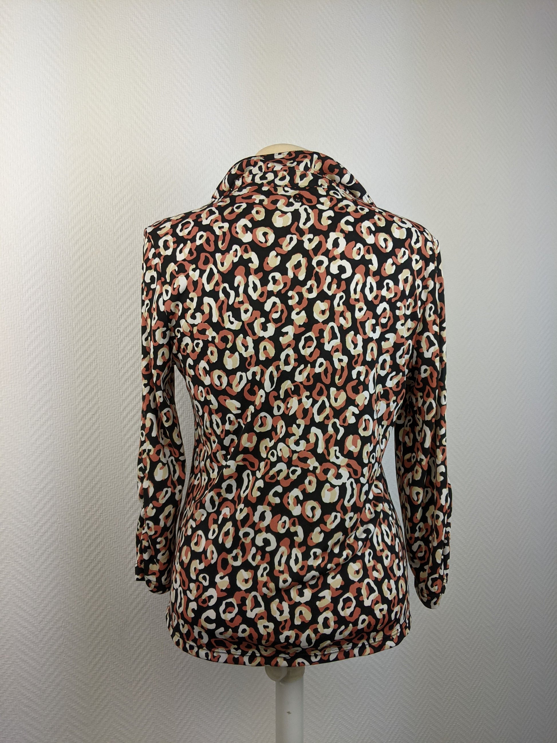 Back view of leopard print blouse