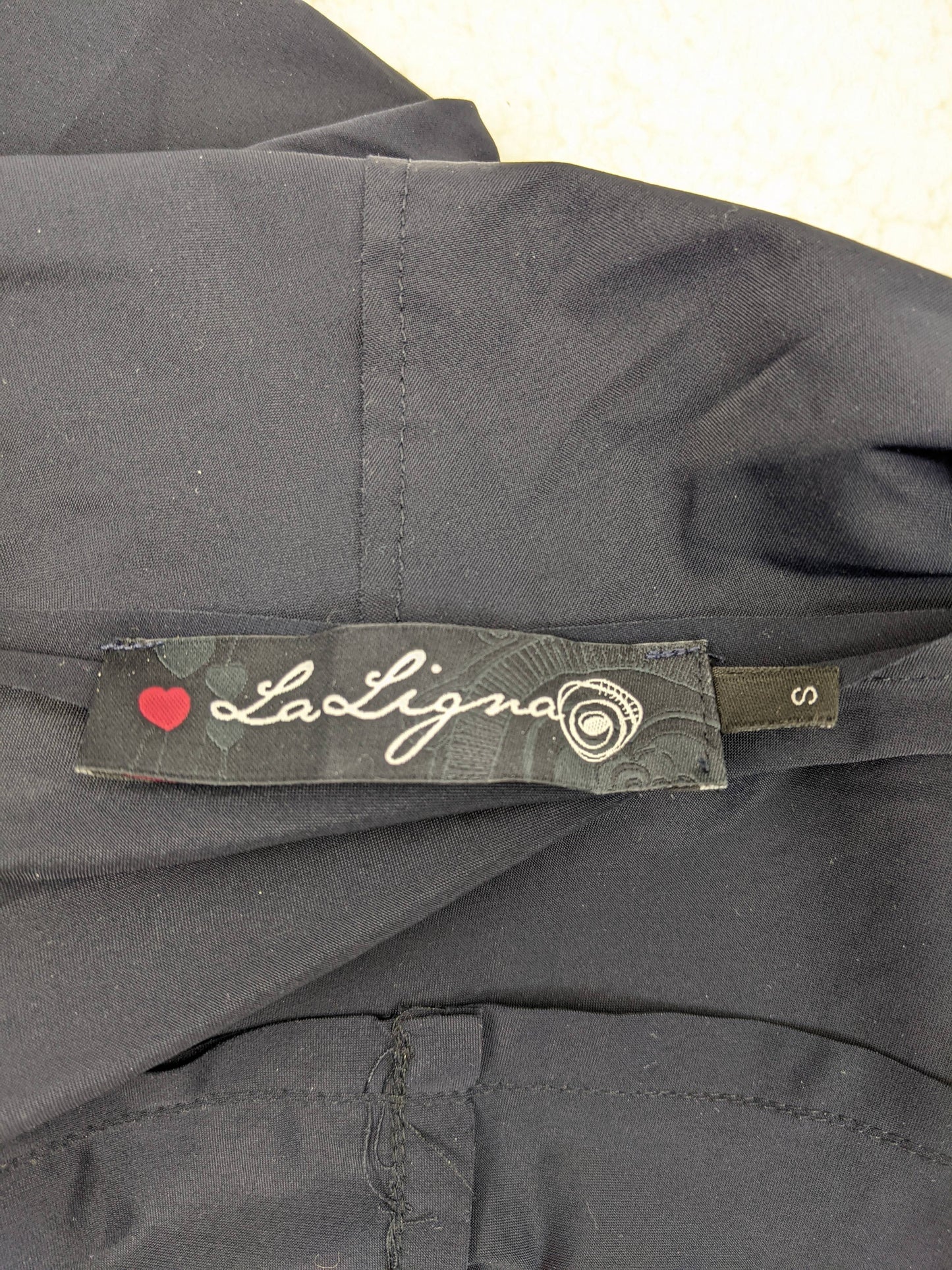 Close-up of LaLigna label showing size S