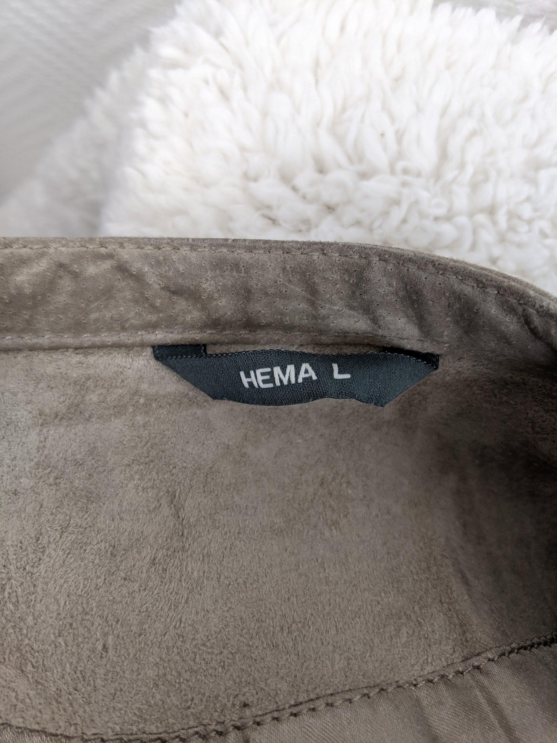Close-up of Hema label inside jacket