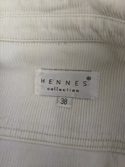Close-up of Hennes Collection label showing size 38