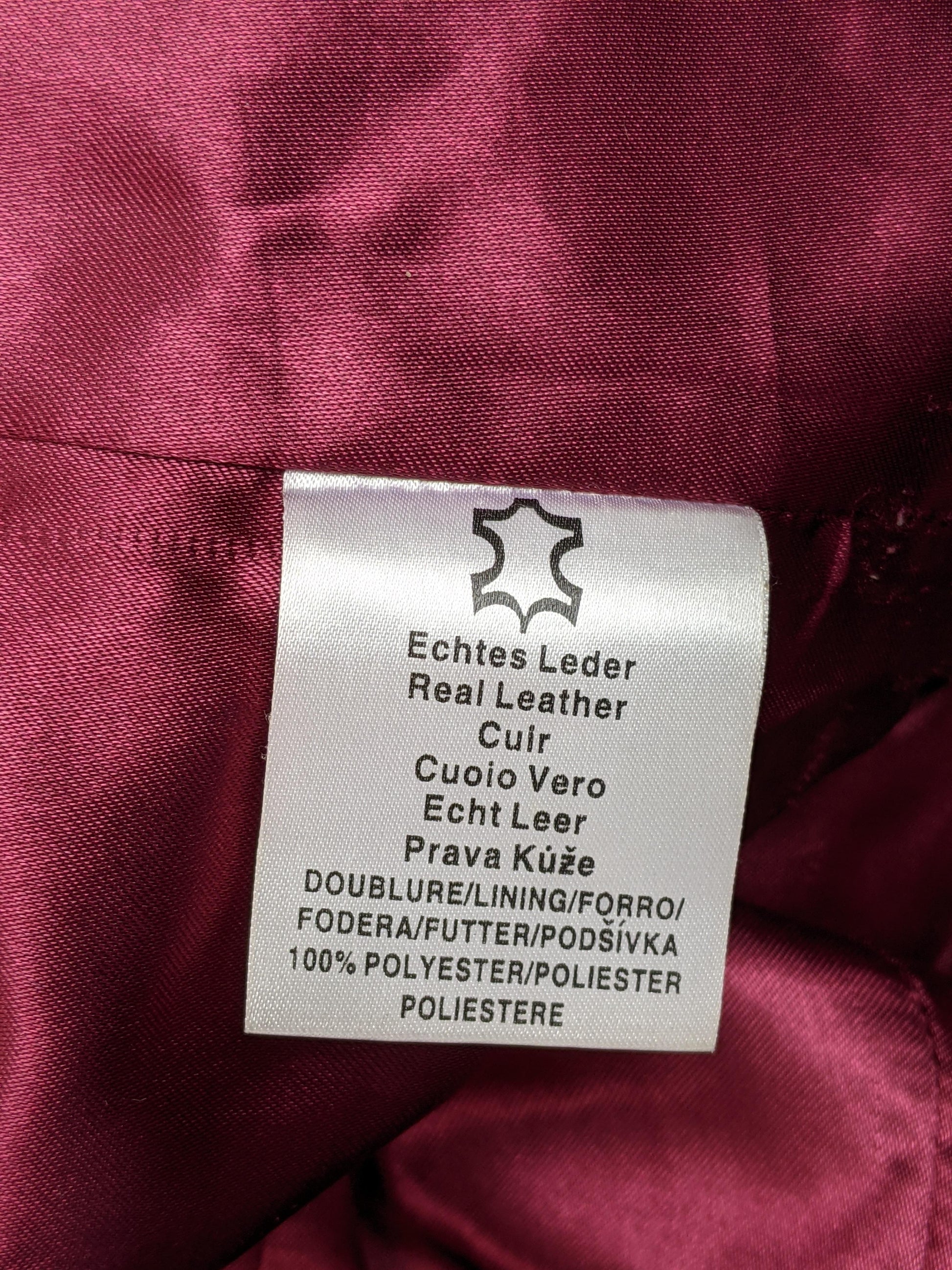 Label of red leather jacket indicating materials