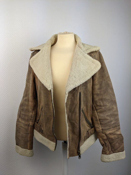 Front view of brown shearling jacket