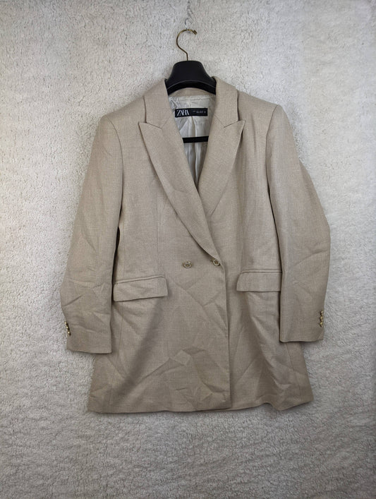 Front view of Zara beige blazer on hanger