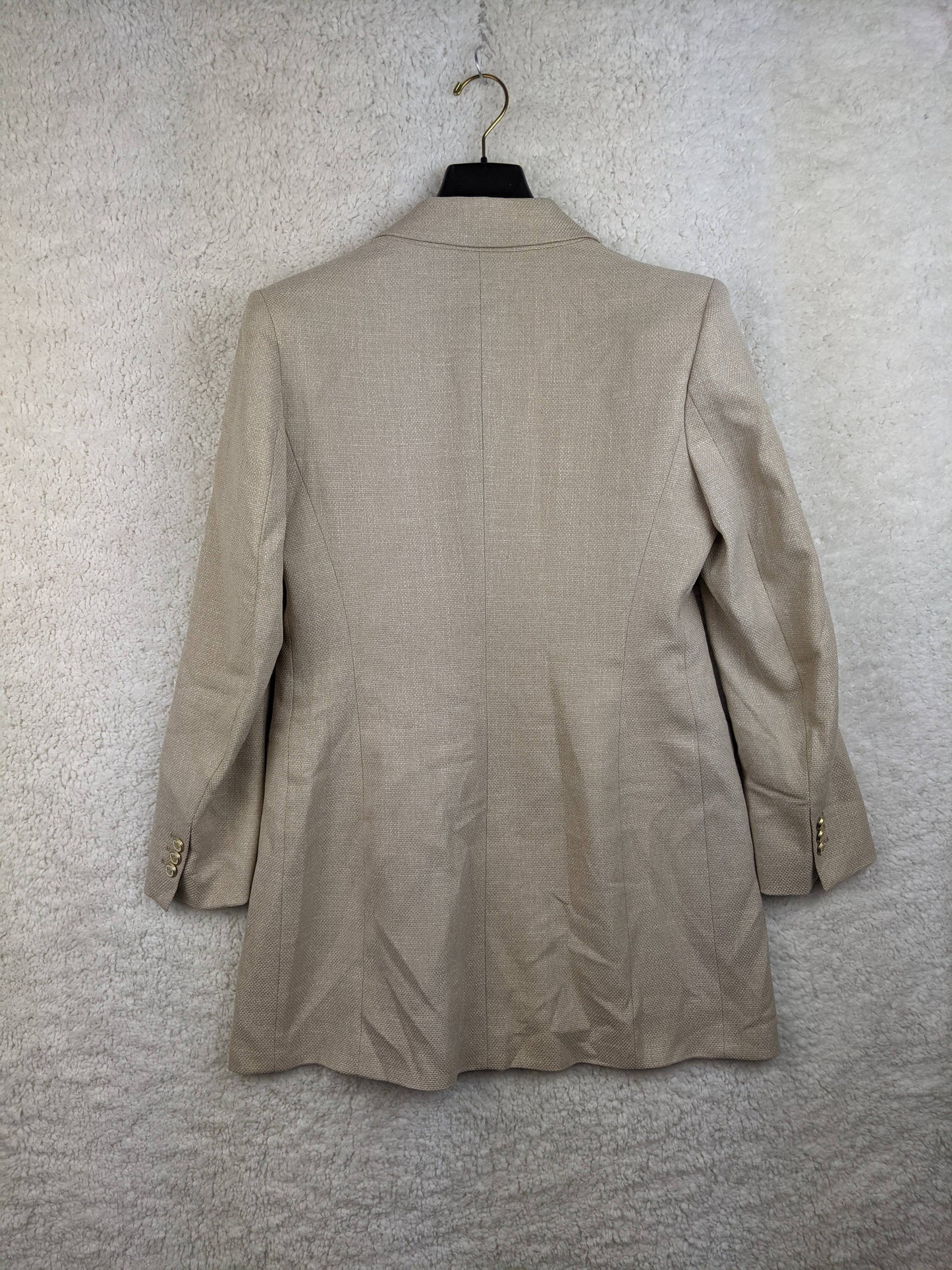 Back view of Zara beige blazer on hanger