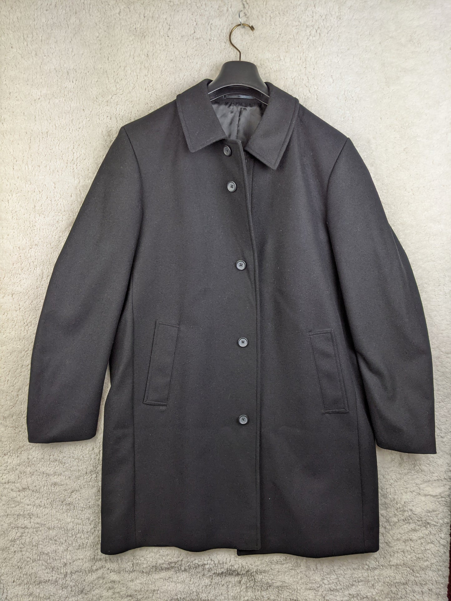 Front view of black de Bijenkorf wool blend coat
