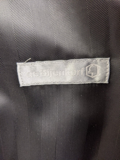 de Bijenkorf brand label inside coat