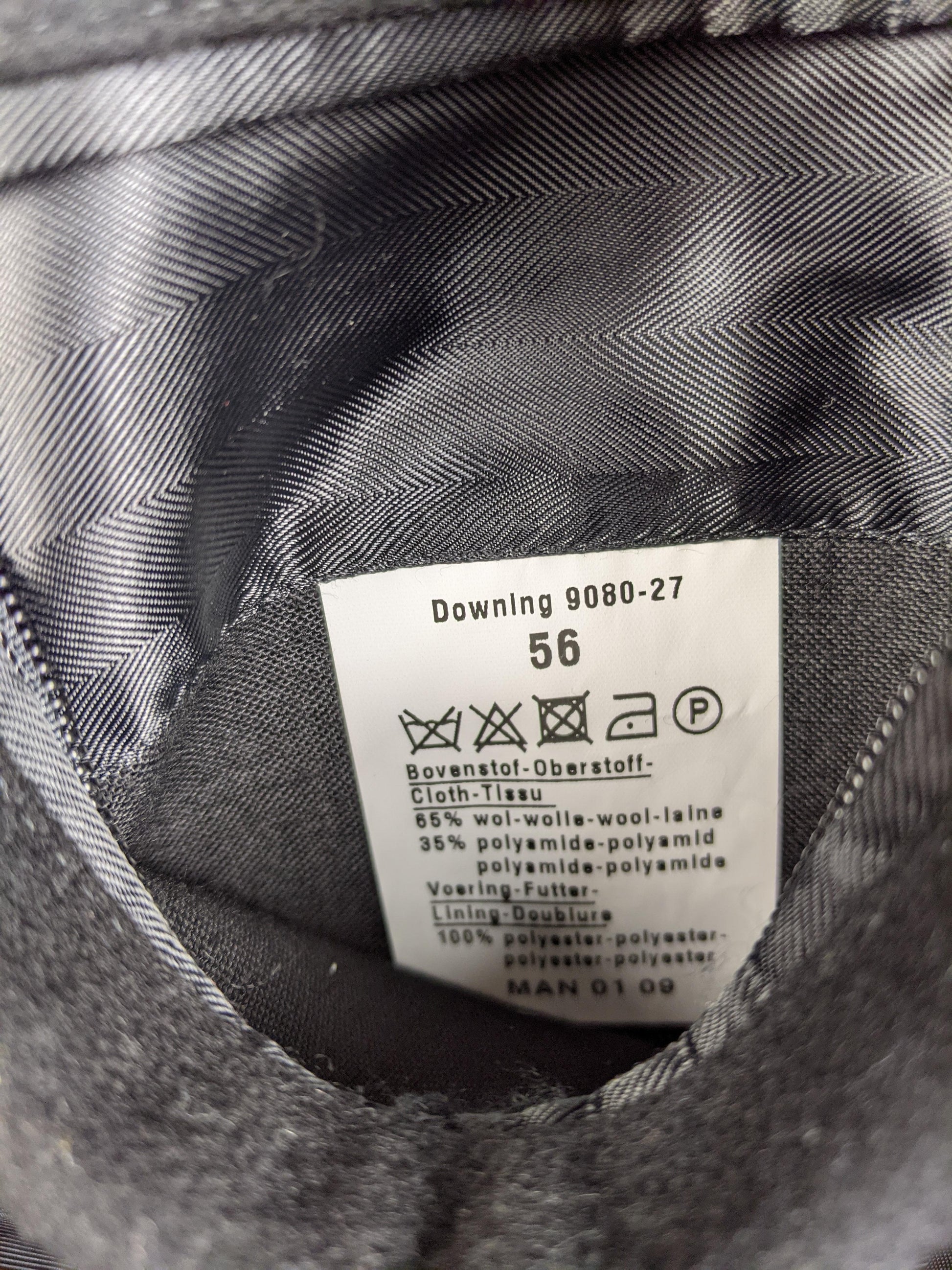 Fabric care label with size and material details