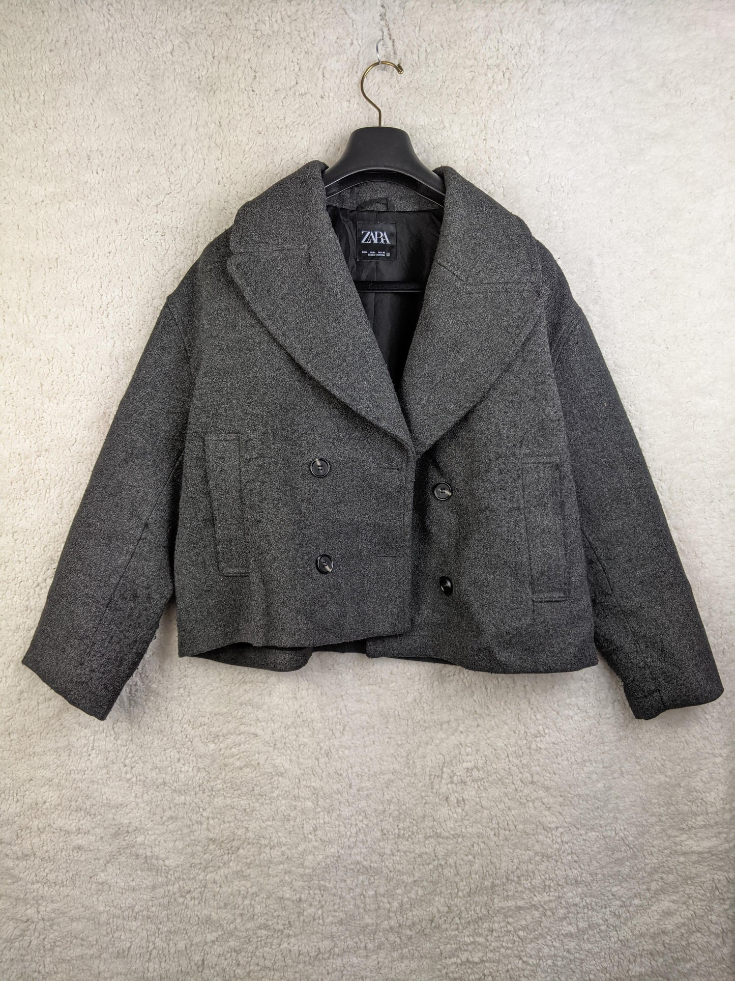 Front view of gray Zara double-breasted jacket