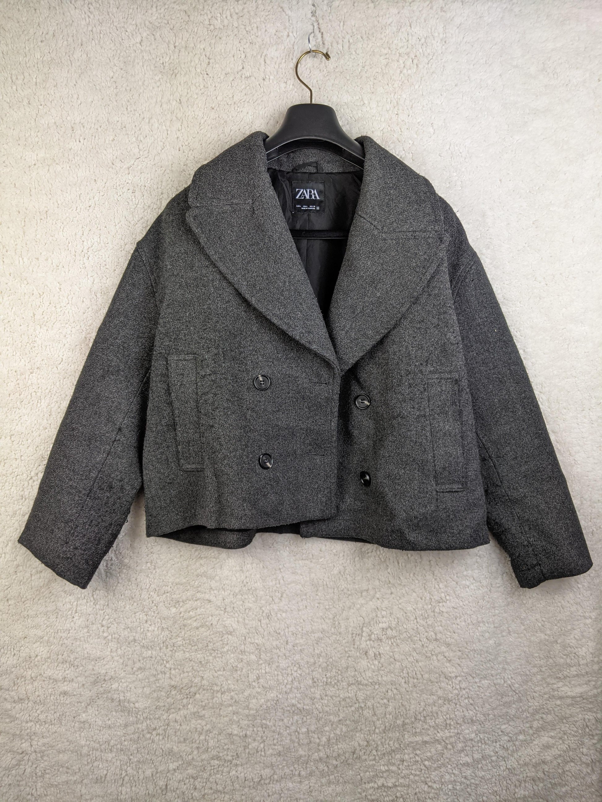 Front view of gray Zara double-breasted jacket
