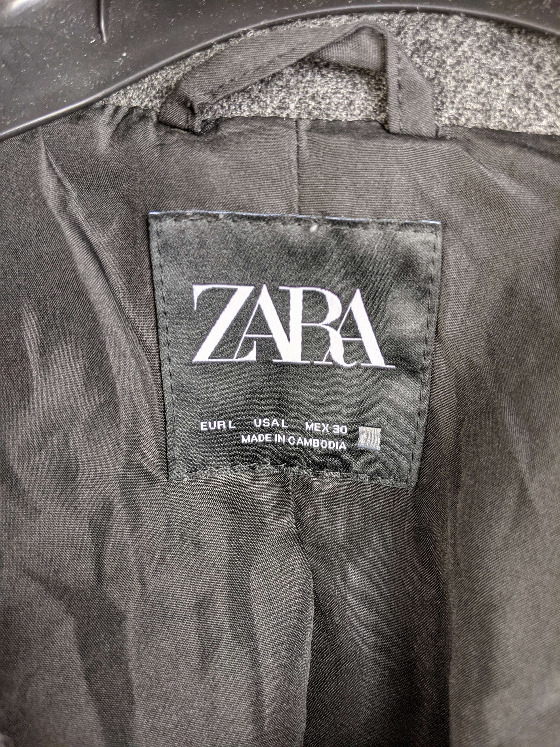 Zara label showing size and origin inside the jacket