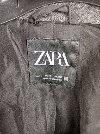 Zara label showing size and origin inside the jacket