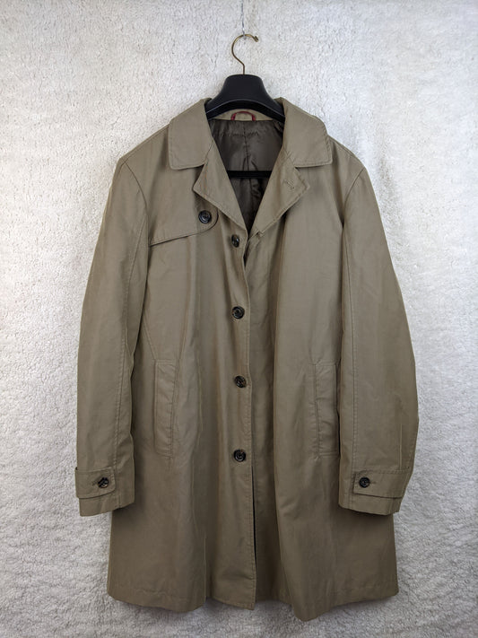 Front view of de Bijenkorf beige trench coat
