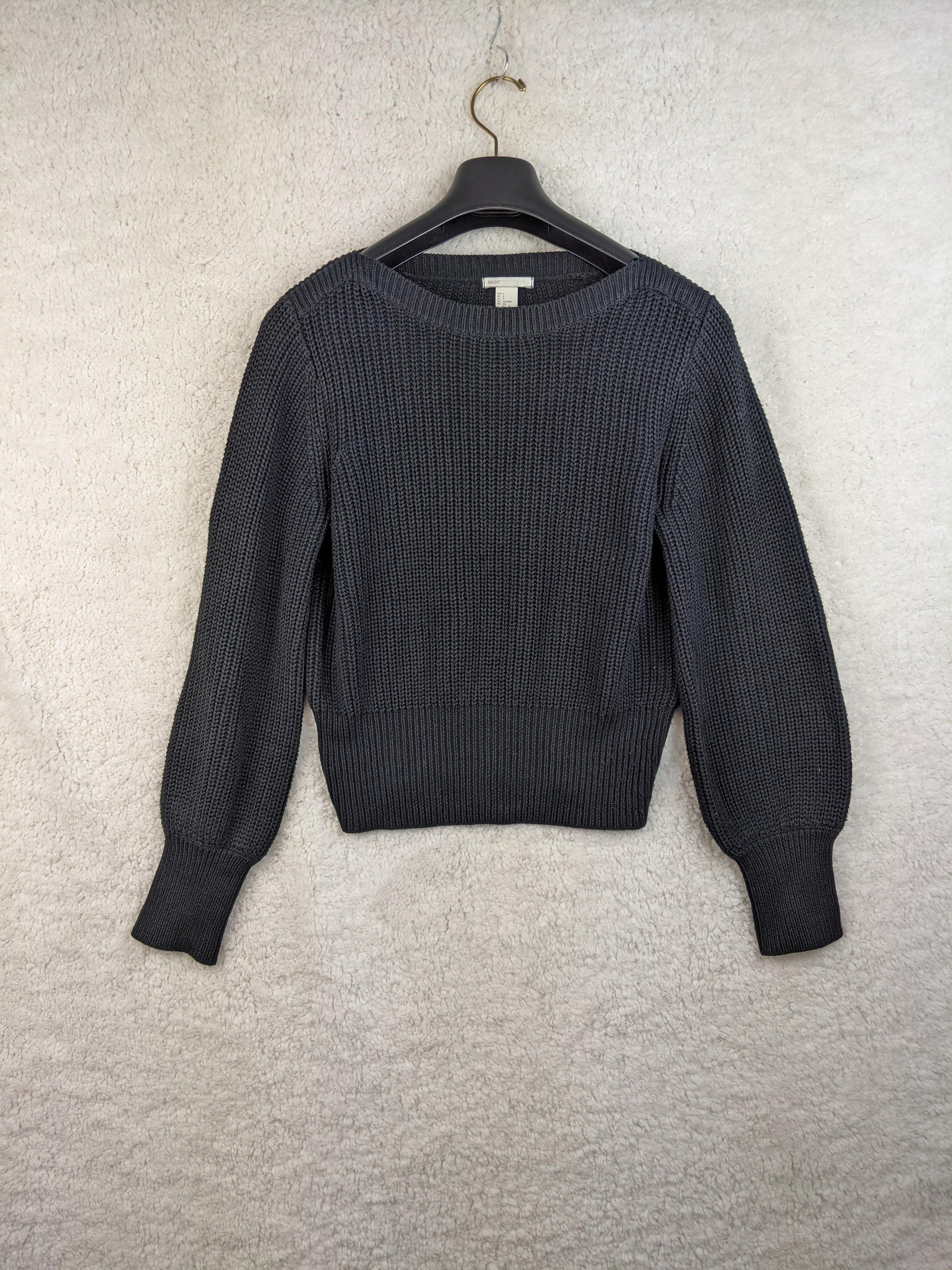 Front view of black H&M knit sweater