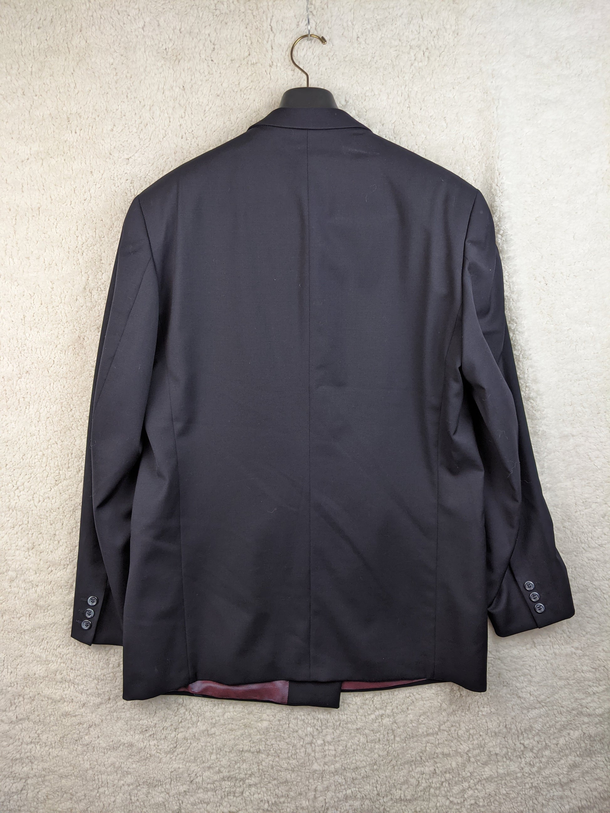 Back view of black double-breasted blazer
