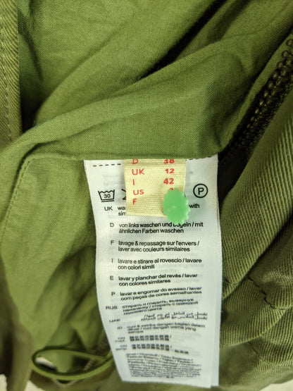Size and care label inside olive green jacket