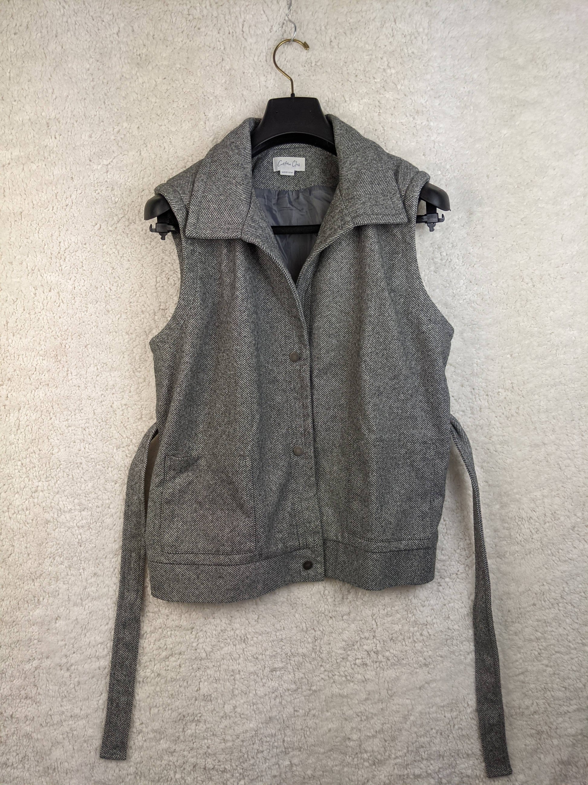 Front view of grey herringbone vest