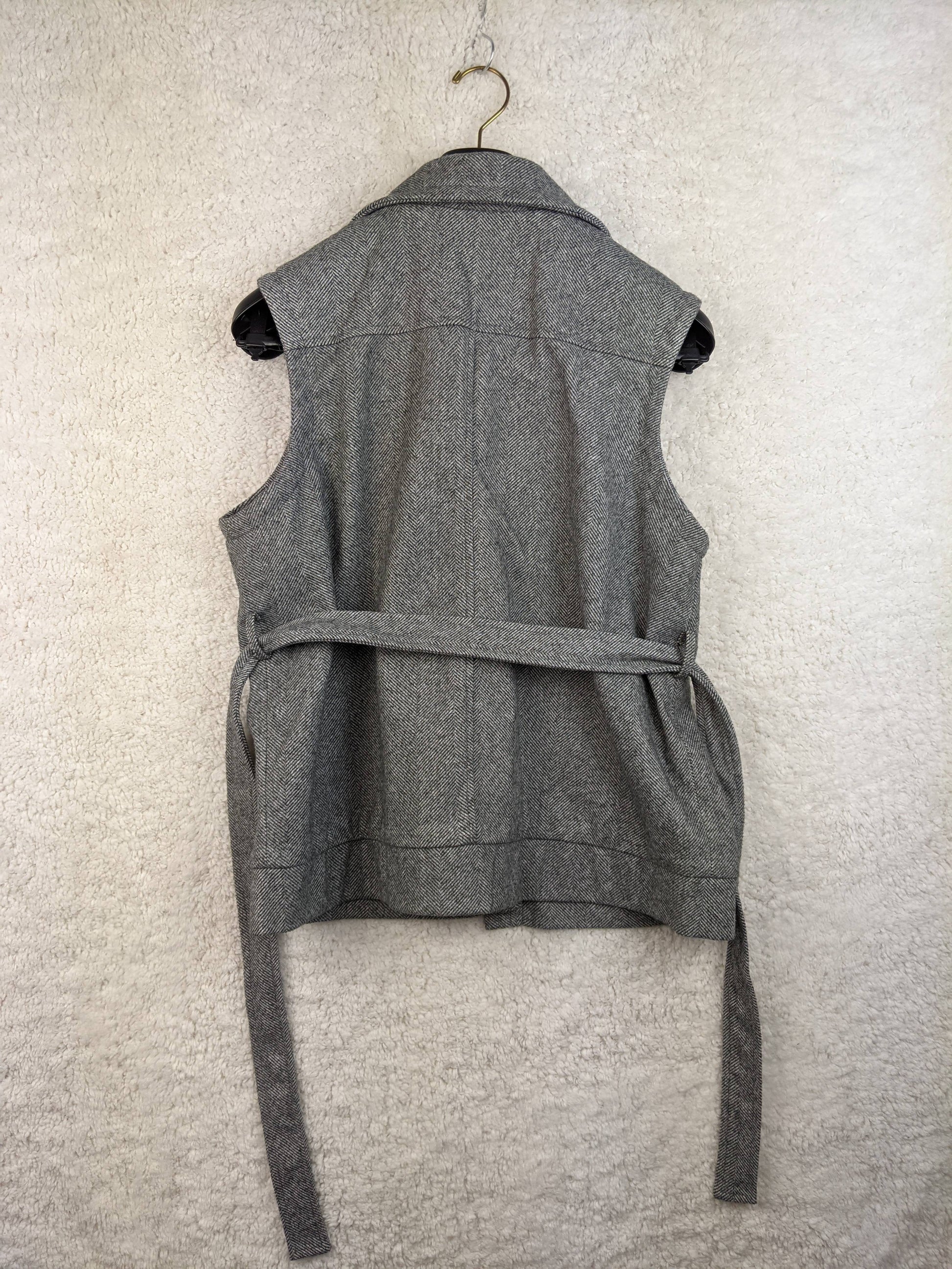 Back view of grey herringbone vest