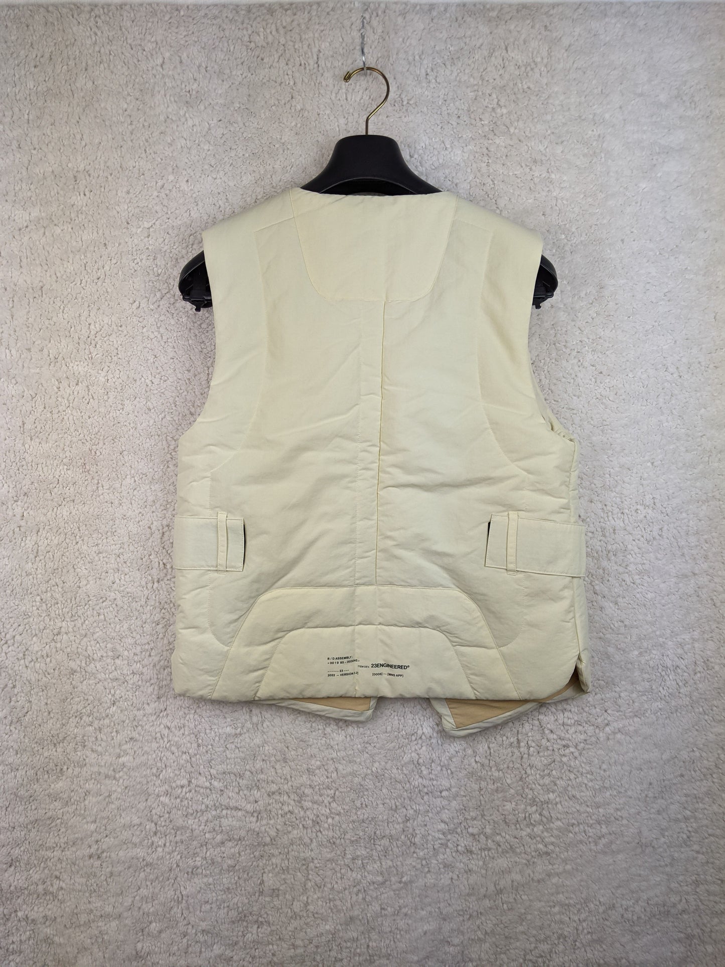 Back view of cream Jordan padded vest