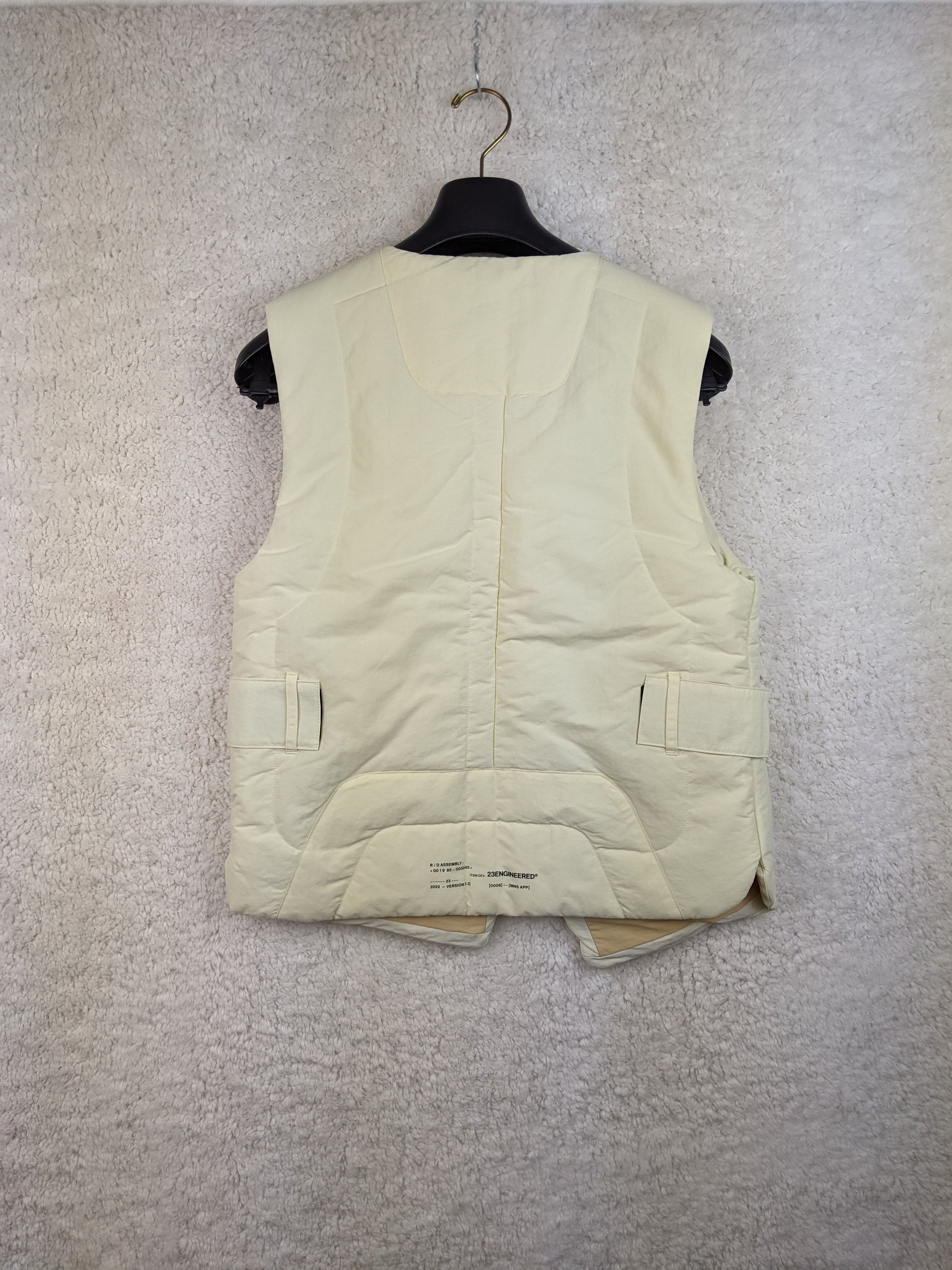 Back view of cream Jordan padded vest