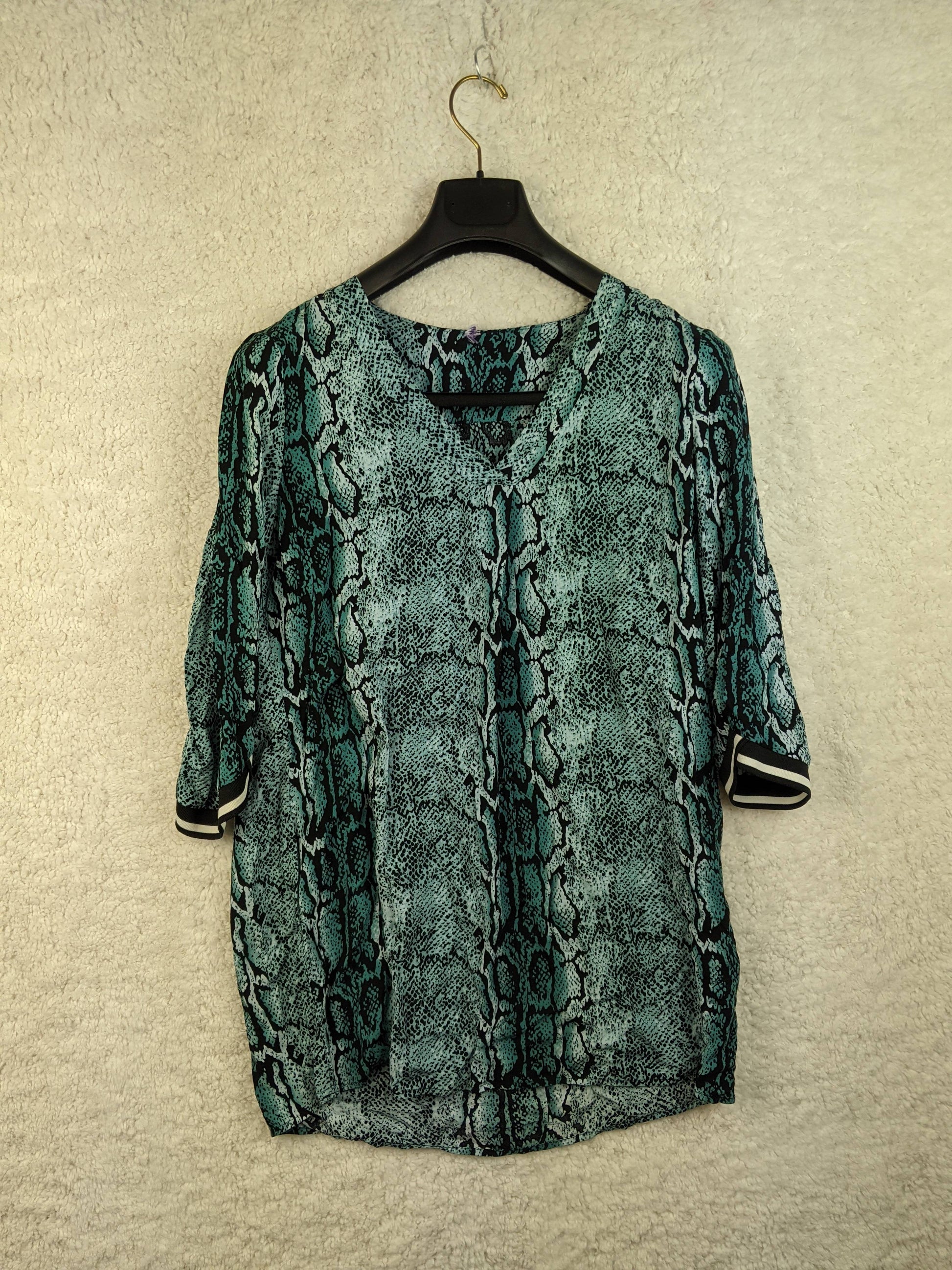 Front view of snake print blouse