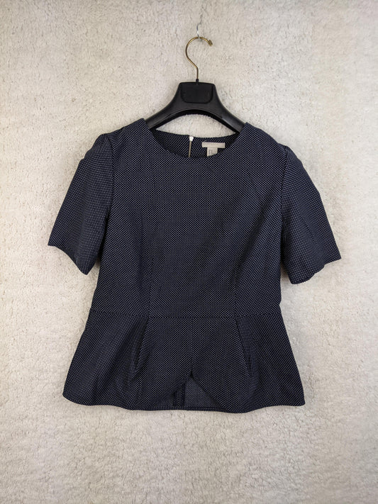 Navy polka dot blouse front view