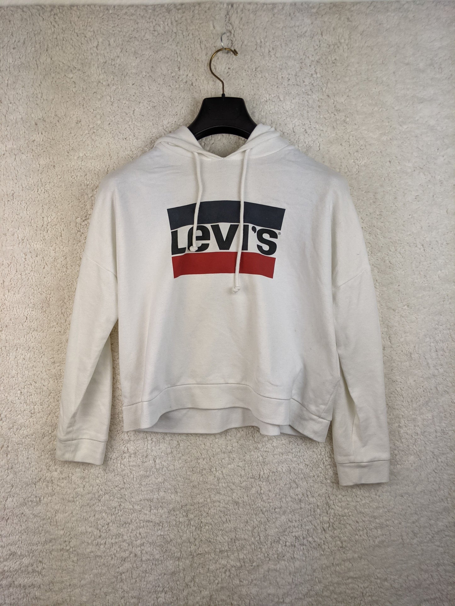 Front view of Levi's white hoodie with logo