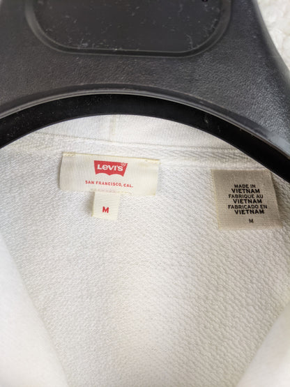 Close-up of Levi's hoodie label showing size M