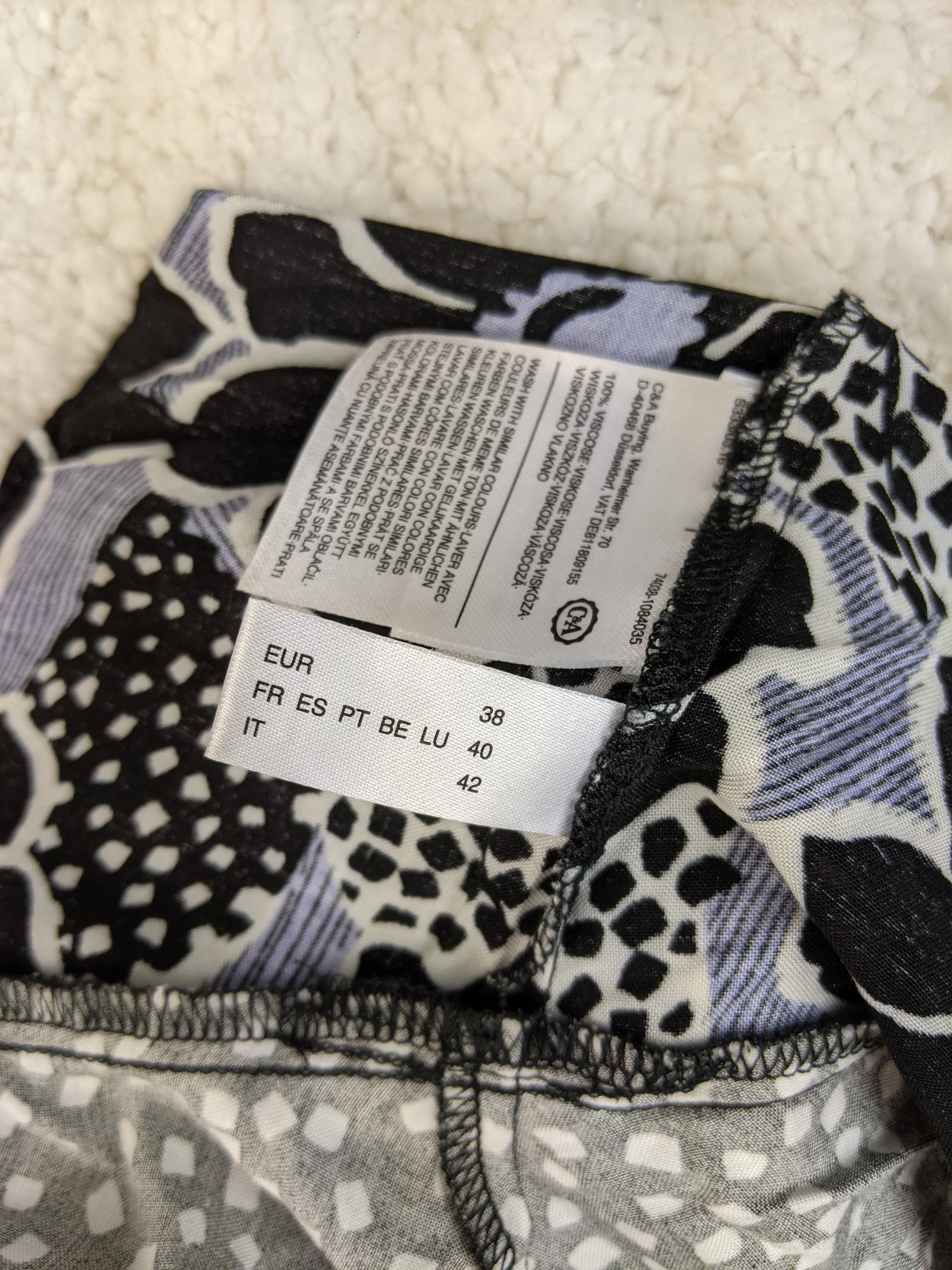Size tag of Yessica black floral midi dress