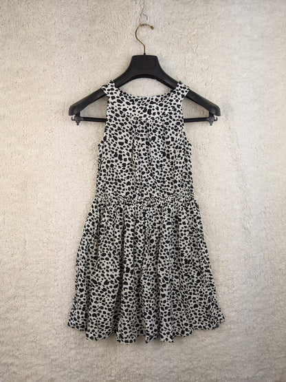 Front view of black and white polka dot sundress