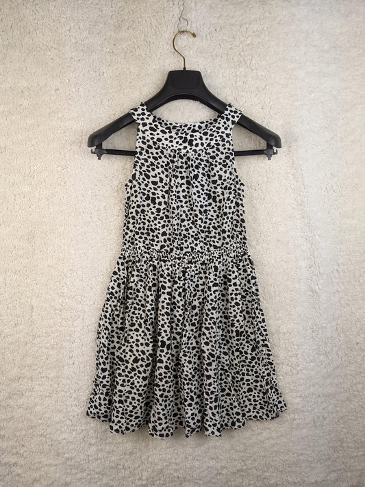 Front view of black and white polka dot sundress