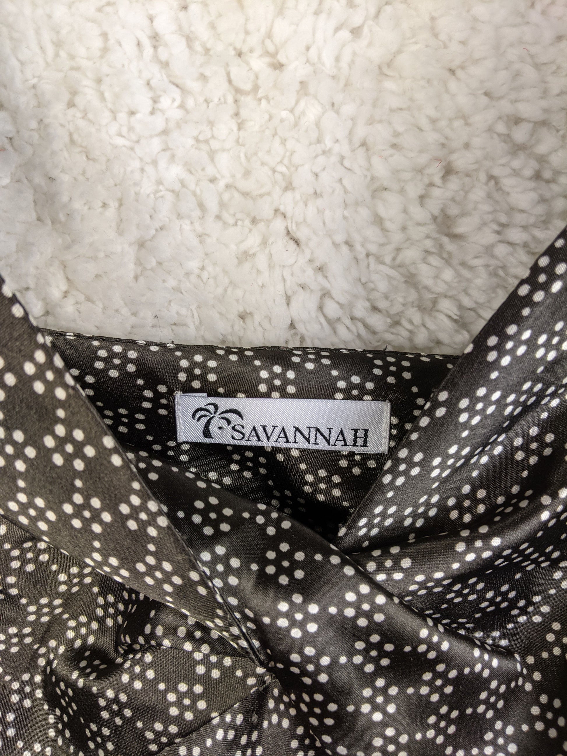 Brand label of Savannah on the dress