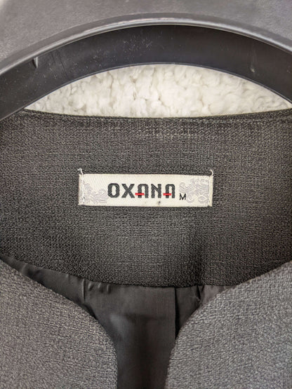 Close-up of Oxana label