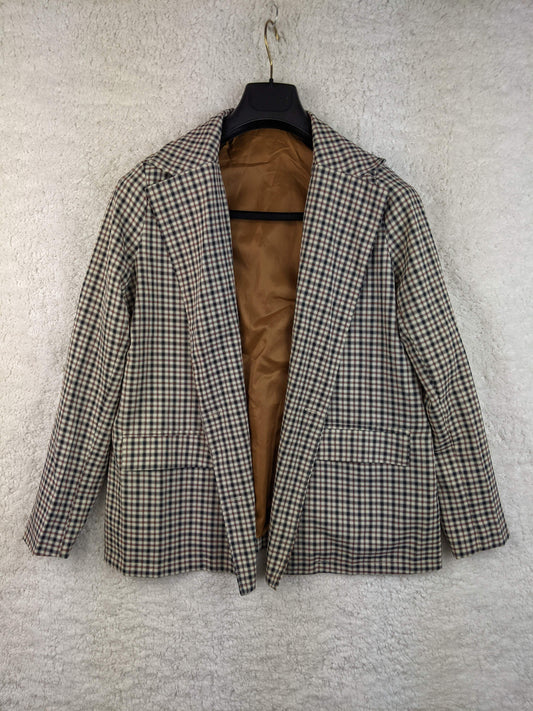 Front view of vintage plaid blazer on hanger