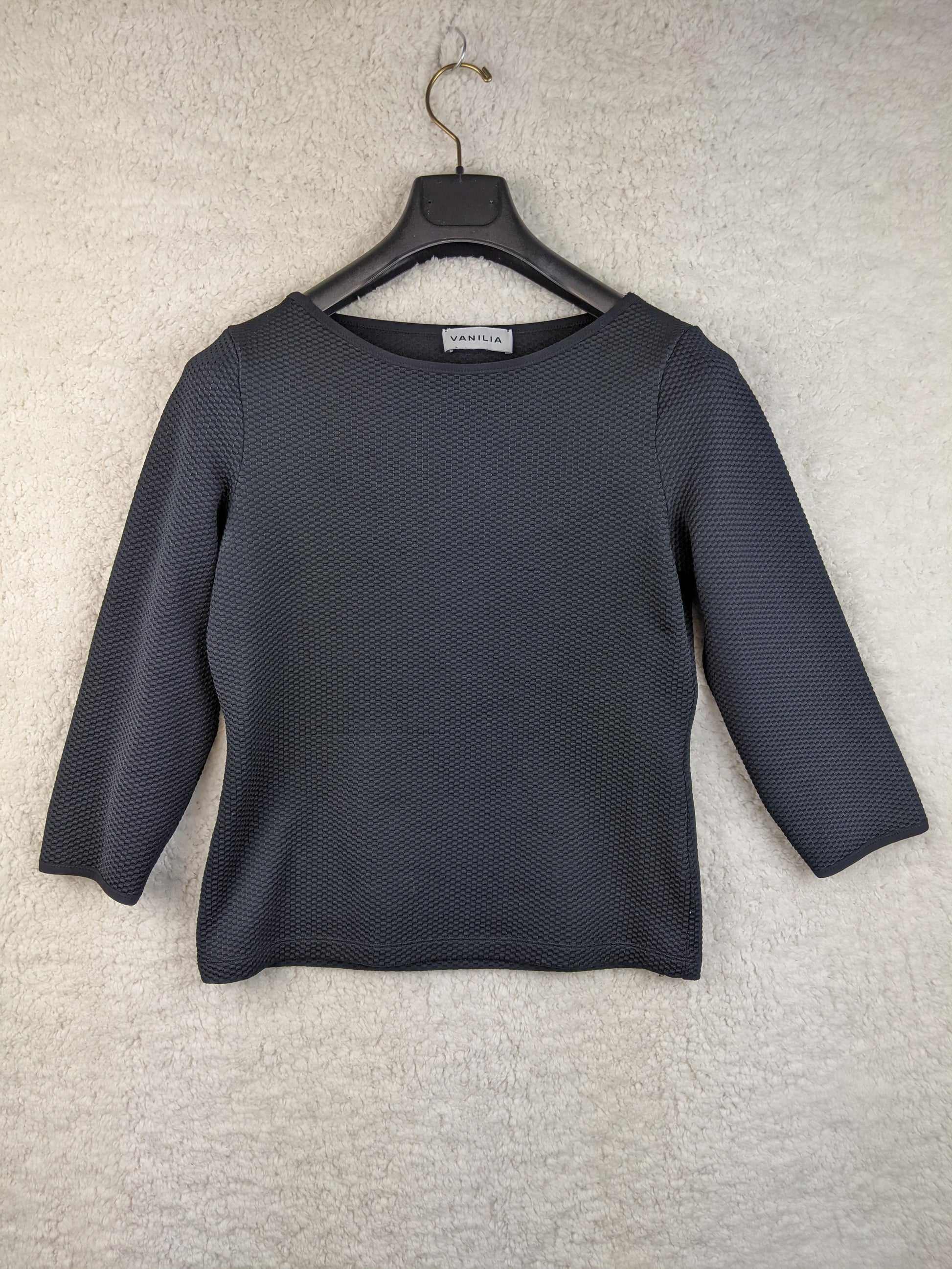 Front view of Vanilia darkest blue textured top