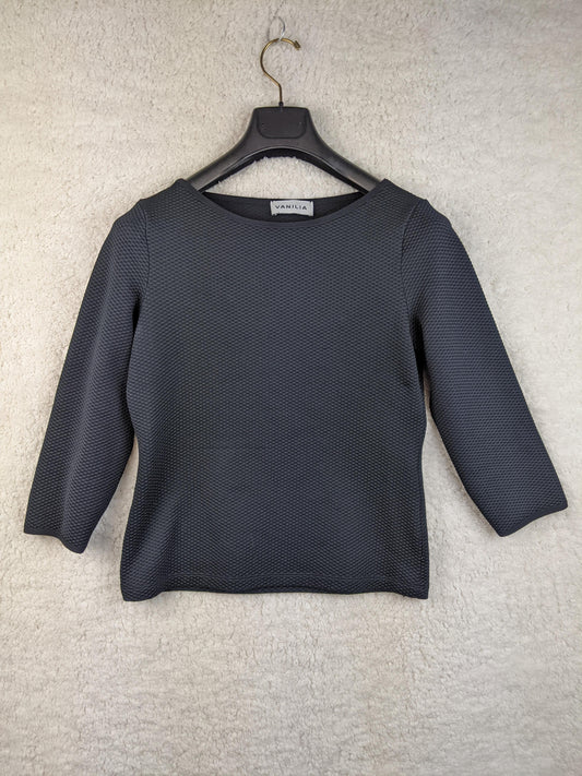Front view of Vanilia darkest blue textured top