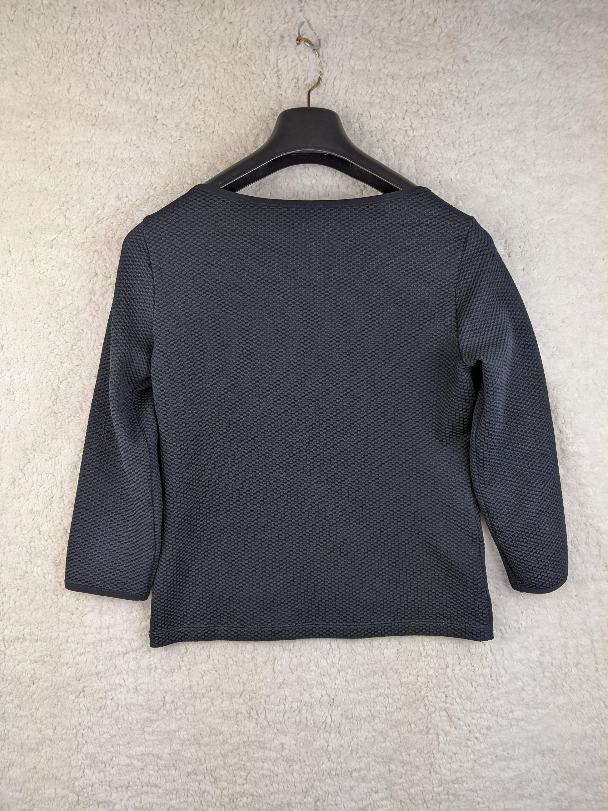 Back view of Vanilia darkest blue textured top