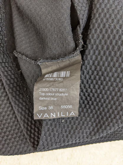 Inside tag showing details and size of Vanilia top