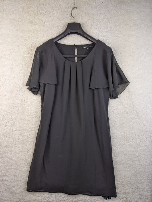 Front view of black chiffon dress on hanger
