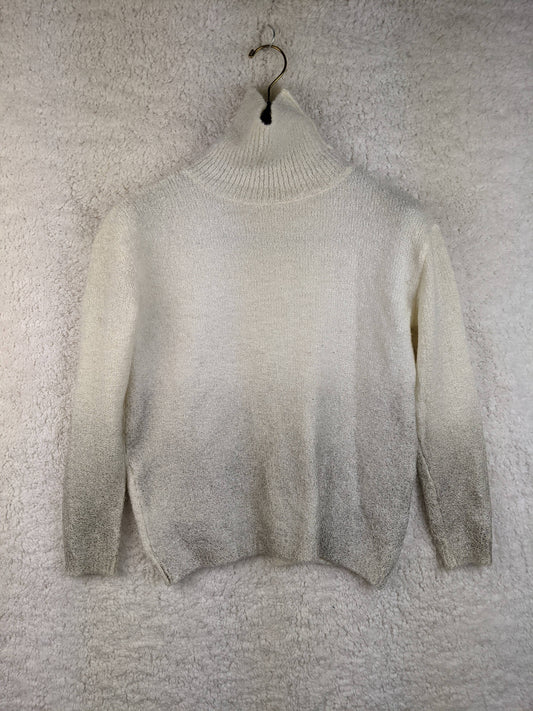 Front view of cream high neck sweater
